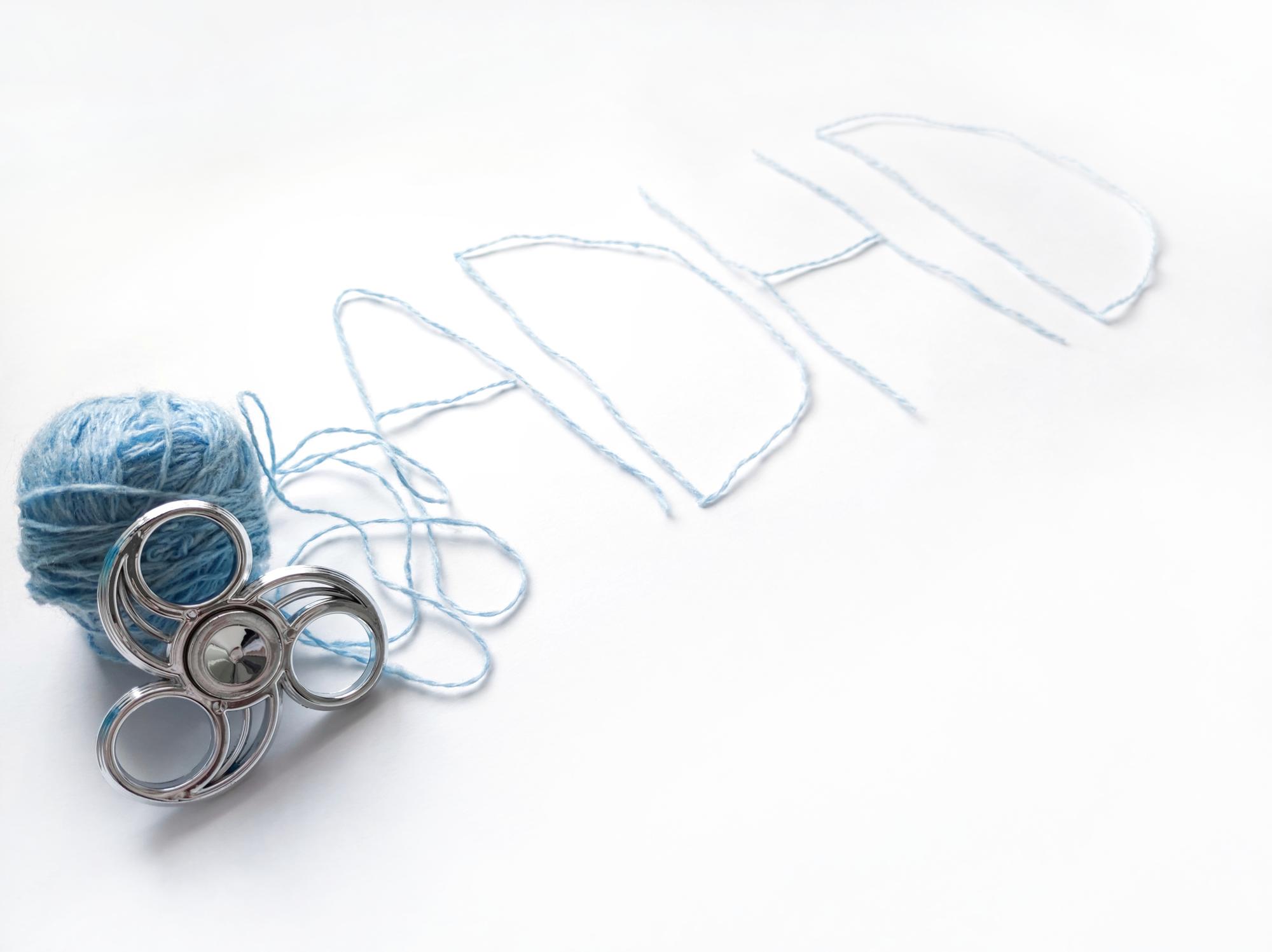 Workshop table with hoops, threads and sketches