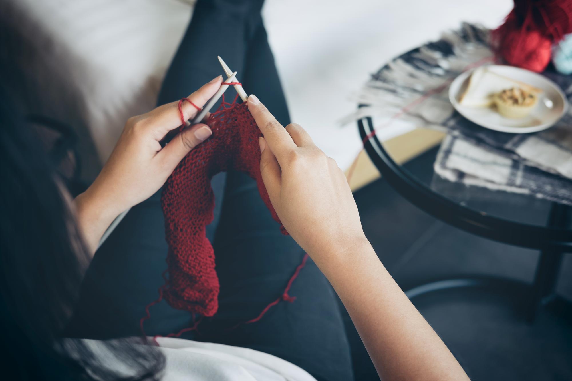 Artisan at work with needle and thread
